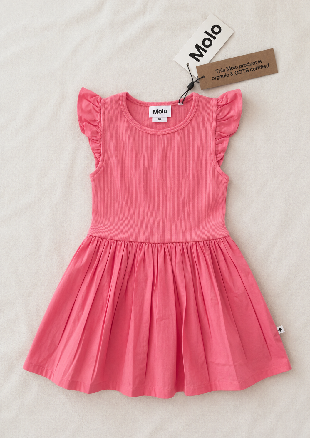 Molo Mädchenkleid rosa Größe 92 neu mit Etikett aus Bio-Baumwolle mit Rüschenärmeln und schwingendem Rock. Vorderseite