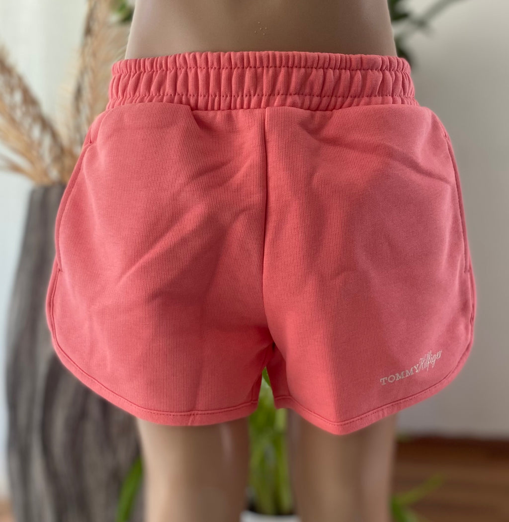 Tommy Hilfiger Sweatshorts für Mädchen in Koralle, Größe 116, mit elastischem Bund und Logo am Bein.